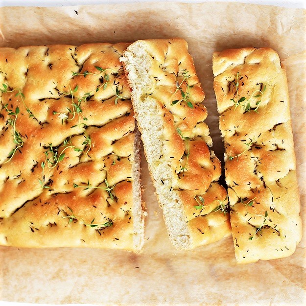 Focaccia bread. fluffy bread with herbs and olive oil