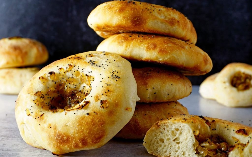 Bialy. almost twin brother of Polish Bagel. with onion feeling