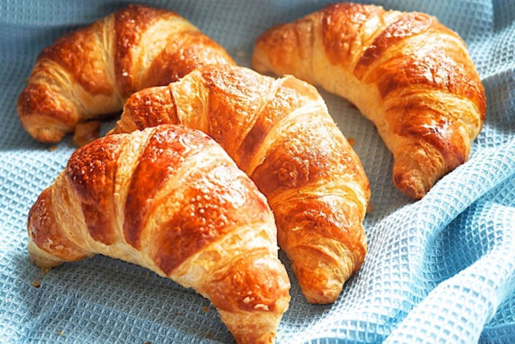 French Croissants. layers of flaky and buttery pastry.